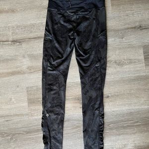 Black Lululemon leggings with floral print